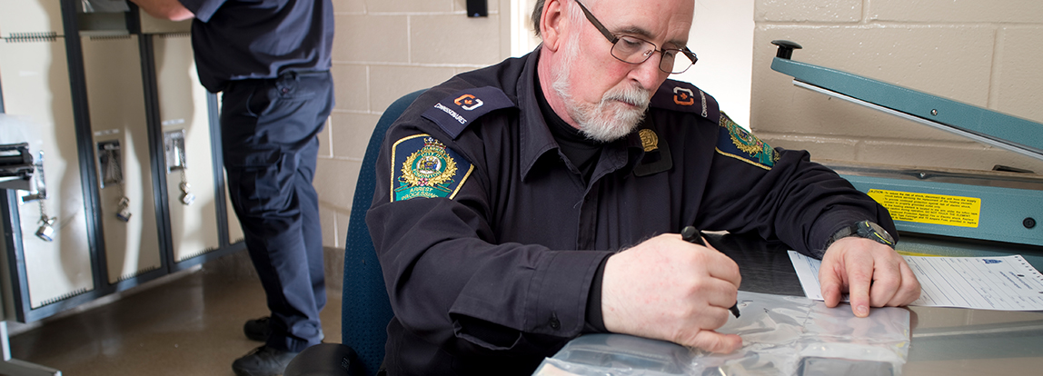 An officer reviewing information