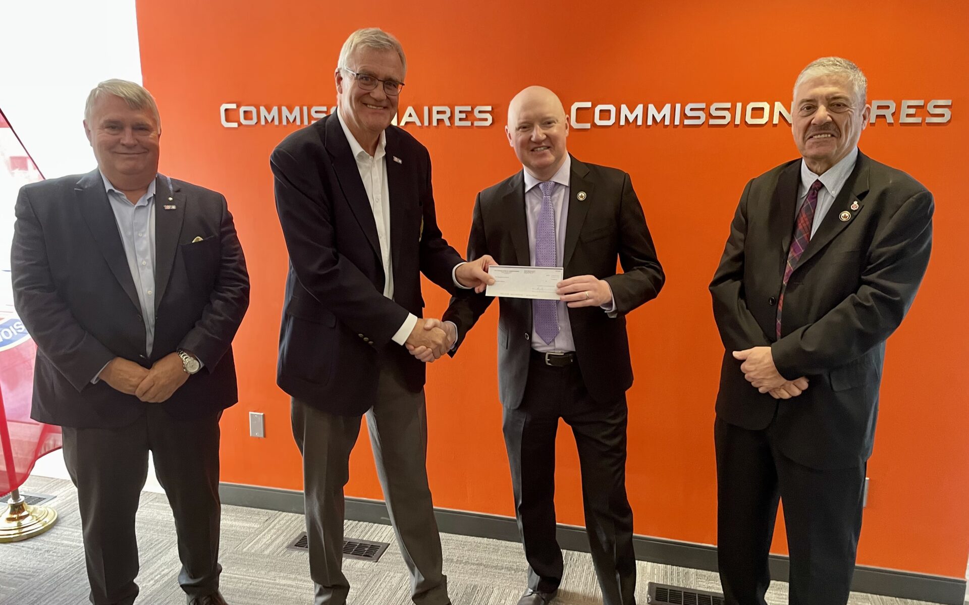 Chief of Staff Captain (N) Harry Harsch (ret’d) and National Board Chair Gord Winkle presenting a $10,000 cheque to Wounded Warriors Canada’s CEO Scott Maxwell and Director of Health Services Philip Ralph